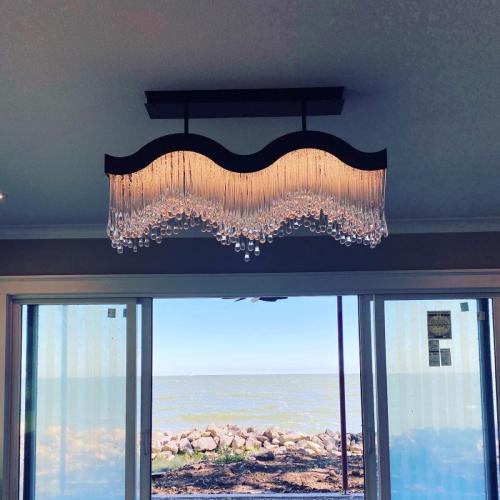 Wave Chandelier with a Lake View