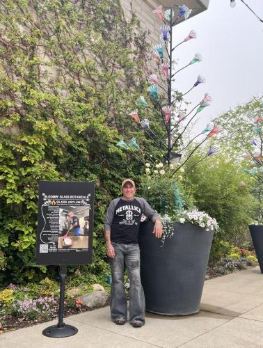 Owner Chris Crimaldi with Flower Tree